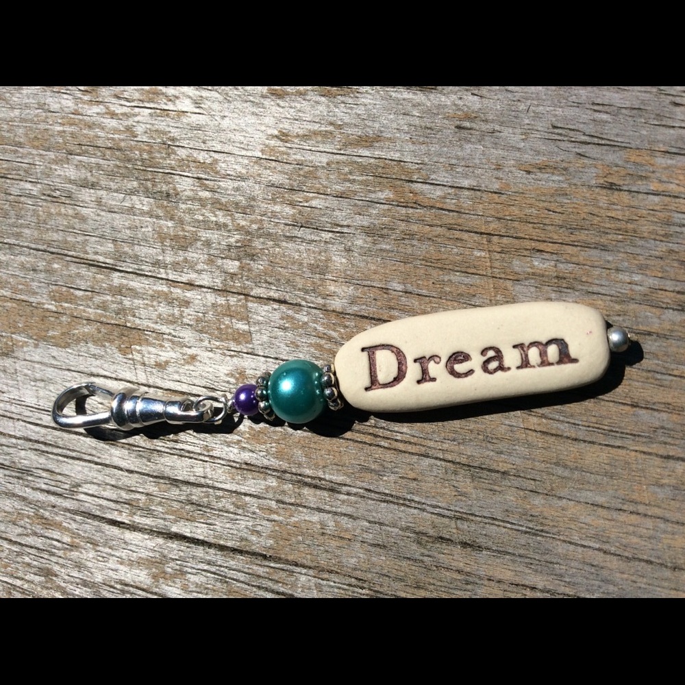 Dream zipper pull/purse charm